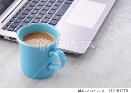 Drinking a cafe latte, a type of coffee with plenty of milk, during breaks at the office Drinking a cafe latte, a type of coffee with plenty of milk, during breaks at the office 120401770