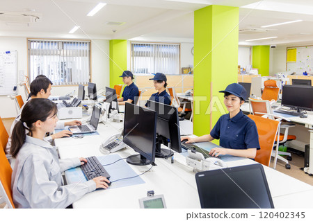 People working in the logistics / transportation industry office People working in the logistics / transportation industry office 120402345
