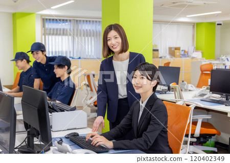 People working in the logistics / transportation industry office People working in the logistics / transportation industry office 120402349