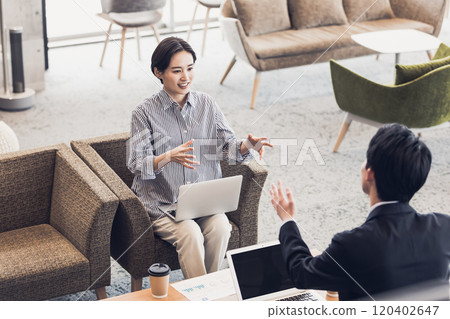 Men and women working in the designer's office 120402647