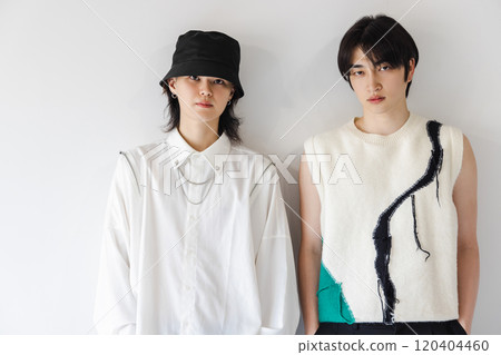 stylish men standing side by side 120404460