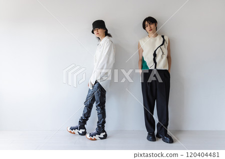 stylish men standing side by side stylish men standing side by side 120404481