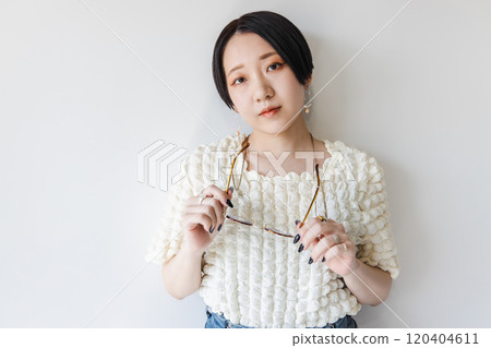 Woman with glasses 120404611