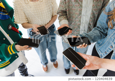 People with smartphones People with smartphones 120404639