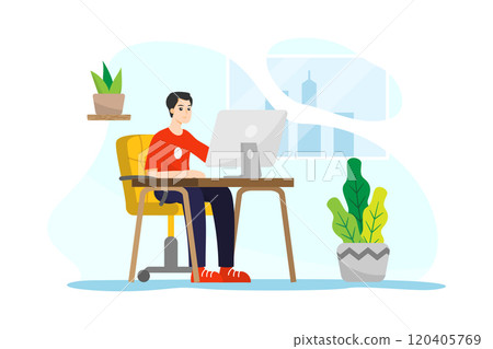 A man sitting in front of a computer working from home during quarantine time 120405769