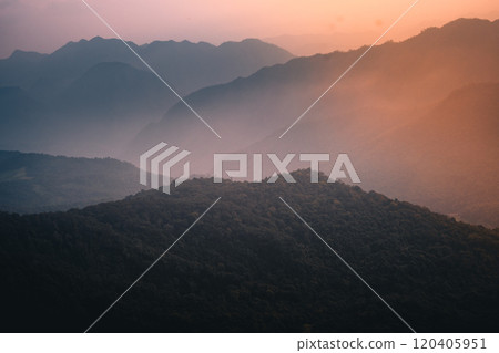 Mountains from above, mountains overlapping with morning fog Mountains from above, mountains overlapping with morning fog 120405951