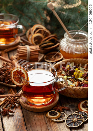 Christmas herbal tea with ingredients on a old wooden table. 120406066