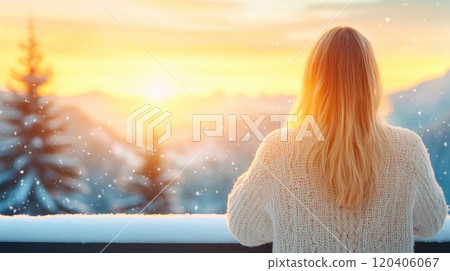 woman with long hair stands on balcony, gazing at beautiful sunset over snowy mountains. scene is serene, with snowflakes gently falling around her woman with long hair stands on balcony, gazing at beautiful sunset over snowy mountains. scene is serene, with snowflakes gently falling around her 120406067