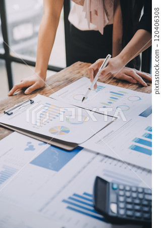 Fund managers team consultation and discuss about analysis Investment stock market at office 120406308