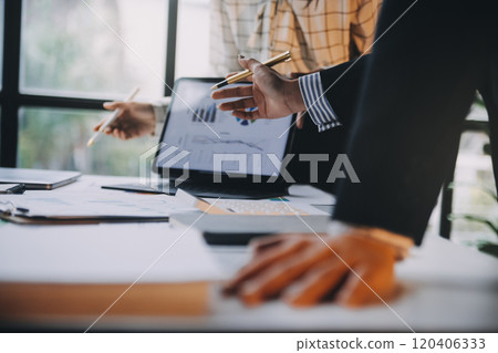 Fund managers team consultation and discuss about analysis Investment stock market at office Fund managers team consultation and discuss about analysis Investment stock market at office 120406333