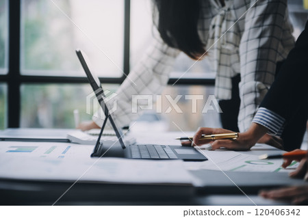 Fund managers team consultation and discuss about analysis Investment stock market at office 120406342