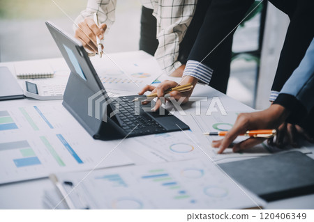 Fund managers team consultation and discuss about analysis Investment stock market at office 120406349