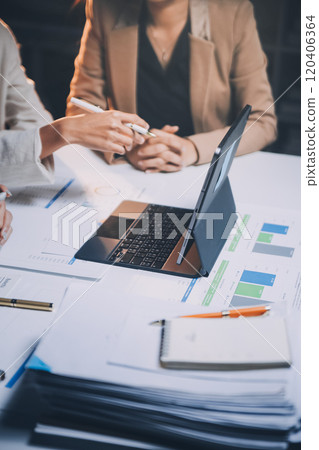 Fund managers team consultation and discuss about analysis Investment stock market at office 120406364