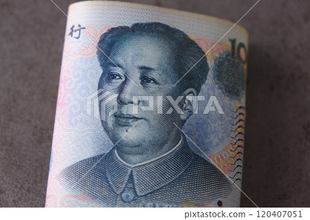 Chinese currency, the Renminbi (RMB), features a portrait of Mao Zedong, creating an image of the booming Chinese economy 120407051