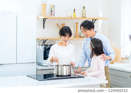 Family cooking in the kitchen Family cooking in the kitchen 120408332