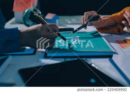 ESG environmental social governance display on laptop on eco-friendly company meeting with business people implementing environmental protection for clean and sustainable future ecology. Trailblazing 120409992