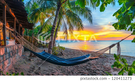 Tropical Paradise Beach at Sunset with Hammock and Palm Trees 120411273
