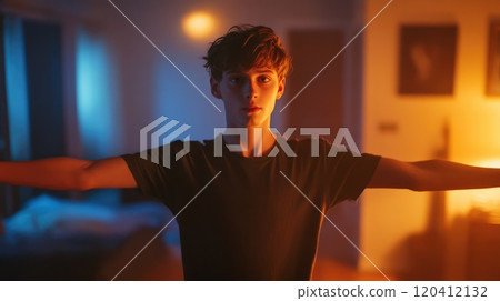 Confident Young Man in Humorous Strong Pose Confident Young Man in Humorous Strong Pose 120412132