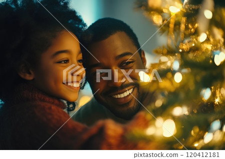 Festive family decorating home with holiday cheer Festive family decorating home with holiday cheer 120412181