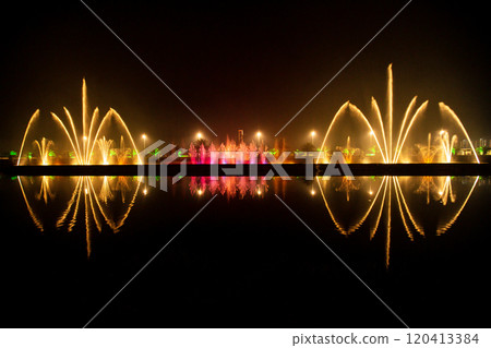 Reflection of the night light show on the water. Reflection of the night light show on the water. 120413384