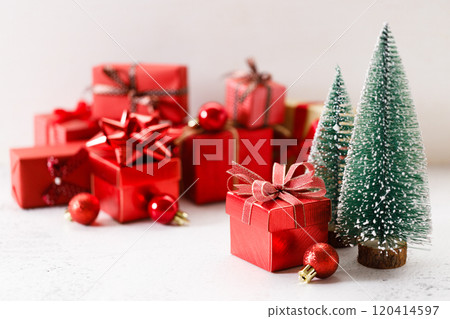 Red gift boxes on white marble background. Christmas New year concept. Selective focus. 120414597