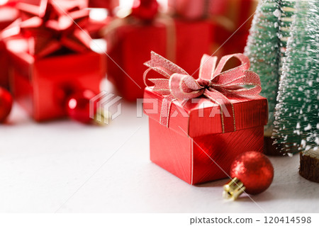 Red gift boxes on white marble background. Christmas New year concept. Selective focus. 120414598