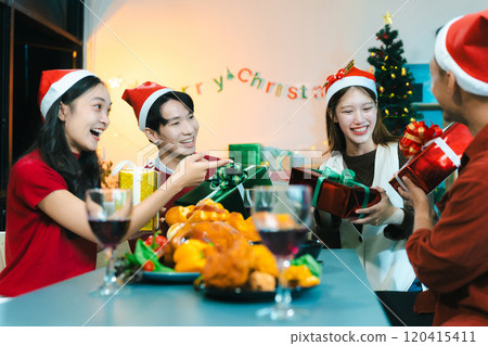 drinks and conversation, social gathering and get together at Merry Christmas young people. 120415411