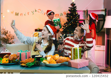 drinks and conversation, social gathering and get together at Merry Christmas young people. 120415432