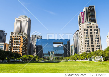 View of the park and surrounding modern buildings in front of Taichung City Council, Taiwan. View of the park and surrounding modern buildings in front of Taichung City Council, Taiwan. 120415496