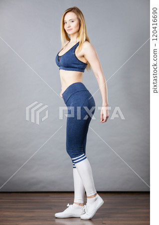 Woman wearing sporty workout outfit Woman wearing sporty workout outfit 120416690