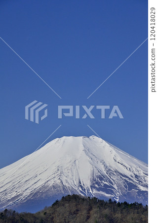 Copy space of Mt. Fuji and blue sky from the observation deck of the power transmission tower at Okunotake in the Doshi mountain range 120418029