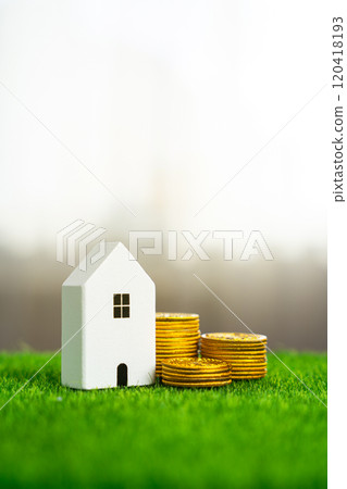 House figurine and money coins. Concept of saving money to pay bills and maintain a home. Buying or renting. Mortgage loans. House figurine and money coins. Concept of saving money to pay bills and maintain a home. Buying or renting. Mortgage loans. 120418193