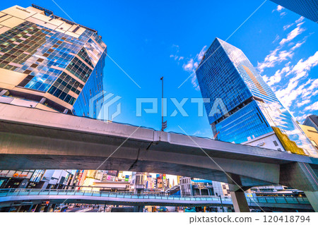 Tokyo cityscape in Japan, NTT Docomo Yoyogi Building... Overlooking Shibuya bathed in the morning sun. On the left is Fukuras... a ray of hope 120418794