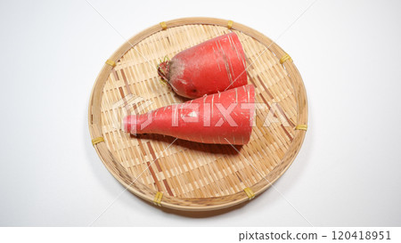 Red radish on a colander 120418951