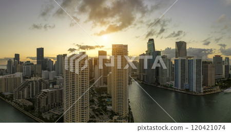 View from above of high skyscraper buildings in downtown district of Miami Brickell in Florida, USA at sunset. American megapolis with business financial district at nightfall View from above of high skyscraper buildings in downtown district of Miami Brickell in Florida, USA at sunset. American megapolis with business financial district at nightfall 120421074