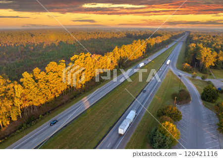 USA highway transportation infrastructure in North Carolina Appalachian mountains. American freeway road with fast driving semi trucks 120421116