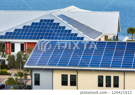 Photovoltaic panels for producing clean ecological electric energy. Florida office buildings with solar roofs. Renewable electricity with zero emission concept 120421812