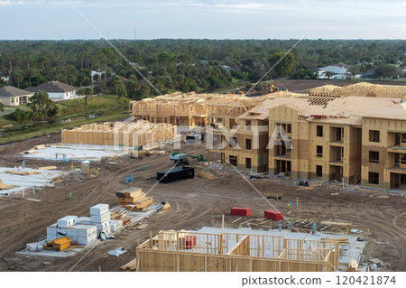 New apartment buildings under construction in North Port, Florida. Development of residential housing in US suburbs. Real estate market in the USA New apartment buildings under construction in North Port, Florida. Development of residential housing in US suburbs. Real estate market in the USA 120421874