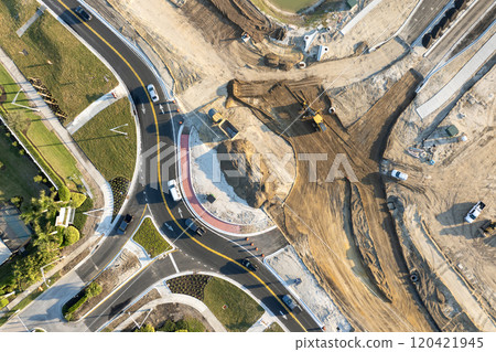 Industrial roadworks. Roundabout on wide American highway under construction. Development of transportation system for rapid transit 120421945