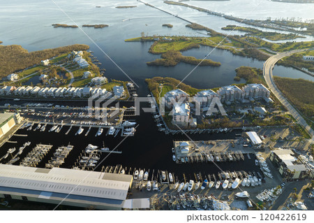 Hurricane Ian destroyed boat station in Florida coastal area. Natural disaster and its consequences Hurricane Ian destroyed boat station in Florida coastal area. Natural disaster and its consequences 120422619