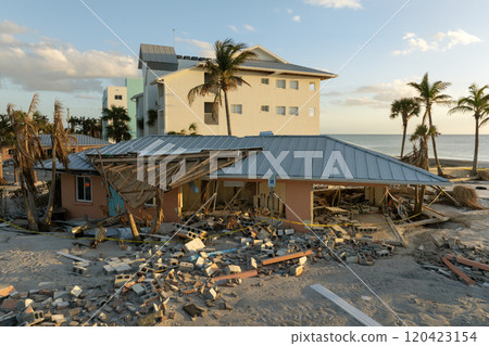 Destroyed house on ocean shore. Hurricane Milton consequences in Manasota Key, Florida. Storm surge severe damage. 120423154