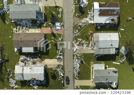 Collapsed and damaged mobile homes after hurricane Ian swept through Florida residential area. Consequences of severe natural disaster 120423196