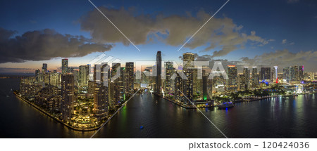 Aerial view of downtown district of of Miami Brickell in Florida, USA. Brightly illuminated high skyscraper buildings in modern American midtown 120424036