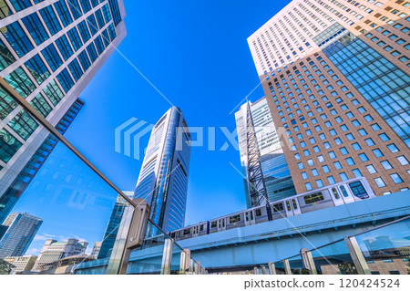 Morning light in Tokyo cityscape, Japan. Overlooking the office buildings in Shiodome. A ray of hope for a new era, November 9th 120424524
