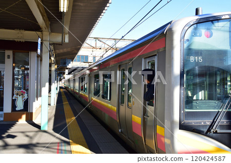 Train departing from the station Train departing from the station 120424587
