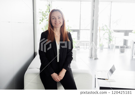 Confident Businesswoman in Modern Office Confident Businesswoman in Modern Office 120425181