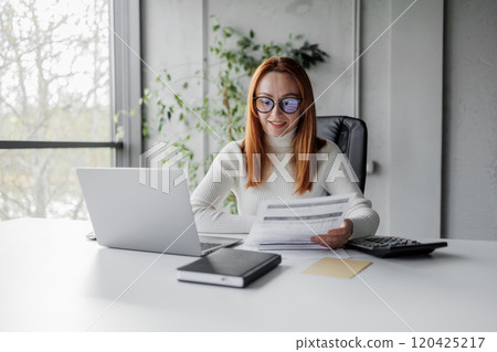 Young Professional Woman at Work 120425217