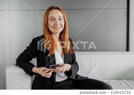Portrait of Professional Woman Using Smartphone 120425258