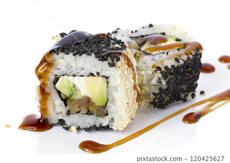 Sushi rolls japanese food isolated on white background.California Sushi roll with tuna, vegetables and unagi sauce closeup.Menu of the Japanese restaurant. Rolls sprinkled with sesame black Sushi rolls japanese food isolated on white background.California Sushi roll with tuna, vegetables and unagi sauce closeup.Menu of the Japanese restaurant. Rolls sprinkled with sesame black 120425627