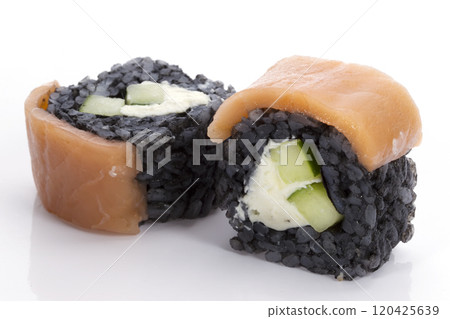 Menu of the Japanese restaurant. Two sushi with black rice closeup Menu of the Japanese restaurant. Two sushi with black rice closeup 120425639